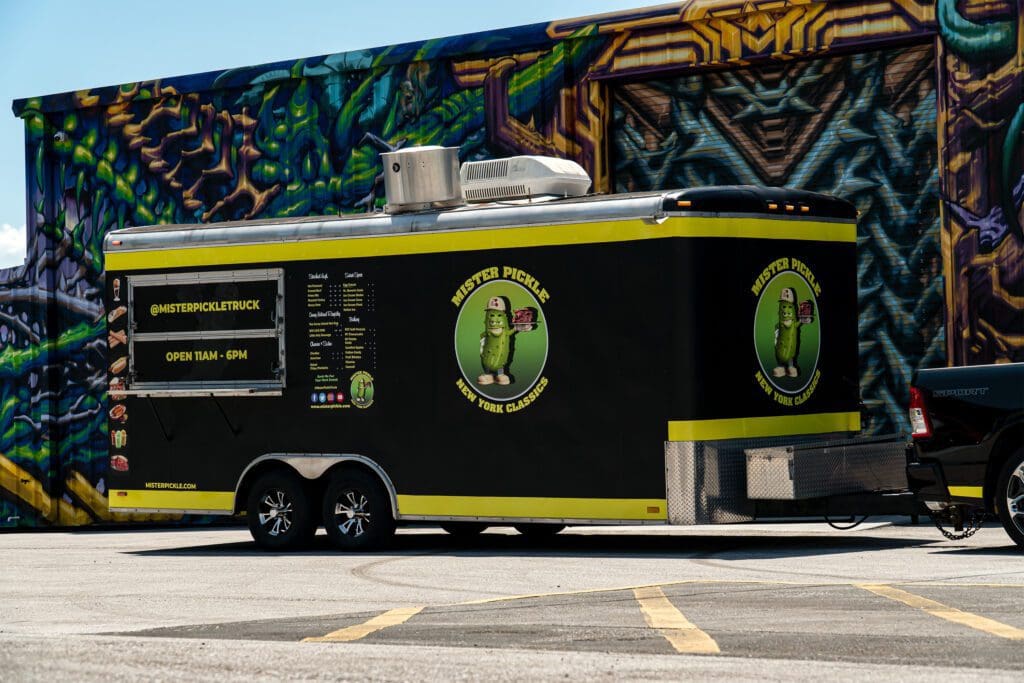 Vehicle fleet wrap on a food truck for Mr. Pickle.
