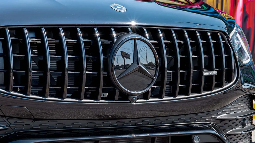 A chrome delete vinyl wrap on a grille of a Mercedes Benz.